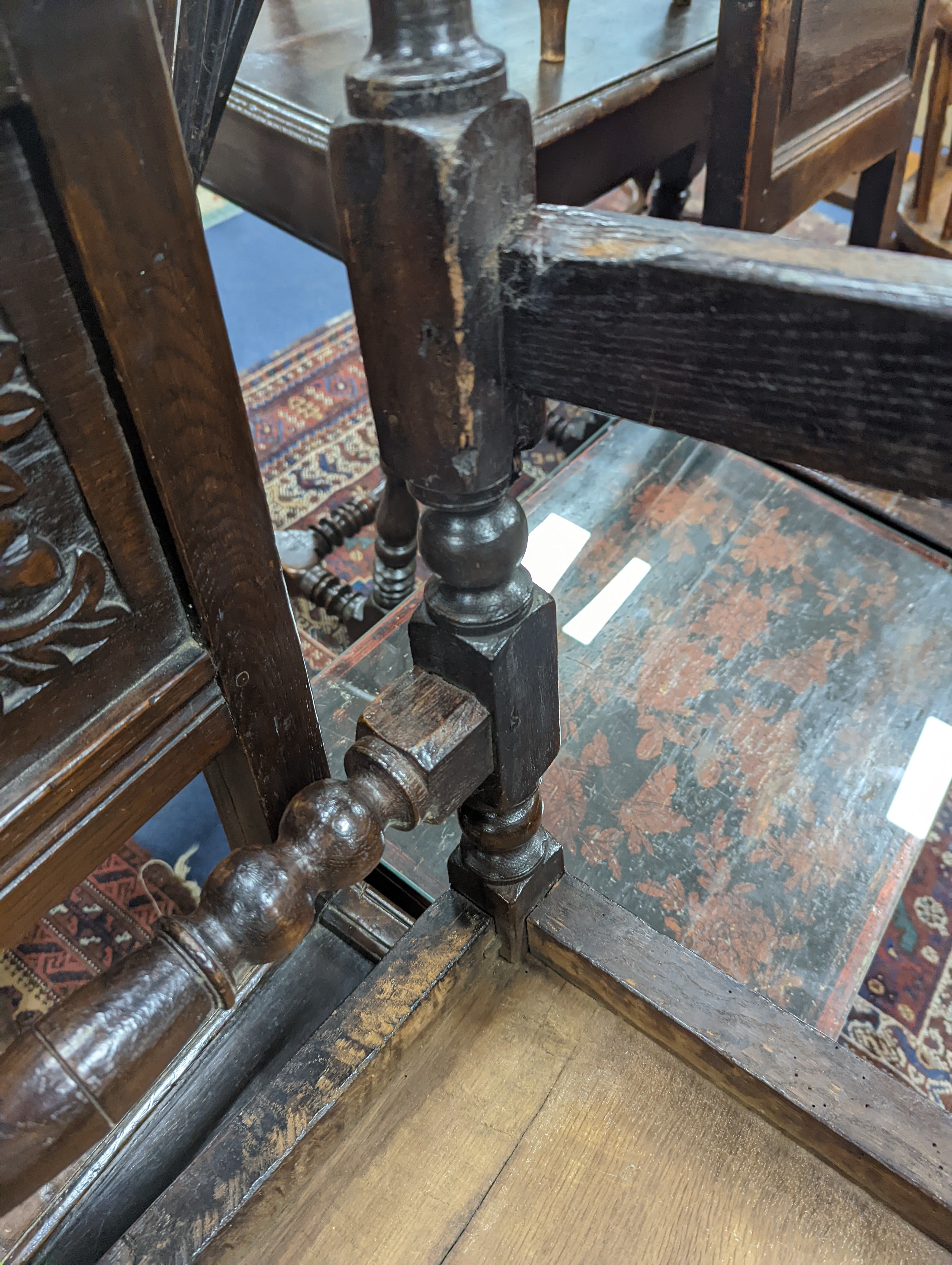 A pair of 17th century Lancashire carved oak side chairs, width 45cm, depth 39cm, height 101cm